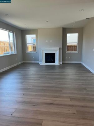Empty room, Fireplace, Interior, Recessed Lighting, Wood Texture Flooring