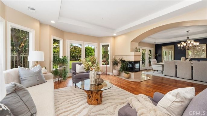 Chandelier, Dining room, Fireplace, Interior, Living room, Recessed Lighting, Wood Texture Flooring