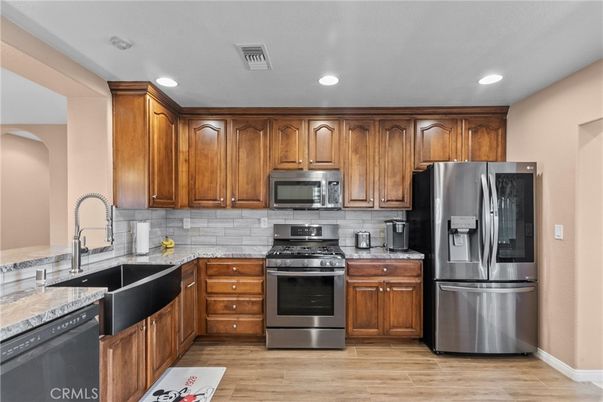 Interior, Kitchen, Recessed Lighting, Stainless Steel Appliances, Wood Texture Flooring
