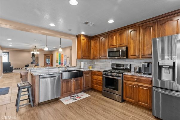 Interior, Kitchen, Pendant Lights, Recessed Lighting, Stainless Steel Appliances, Wood Texture Flooring