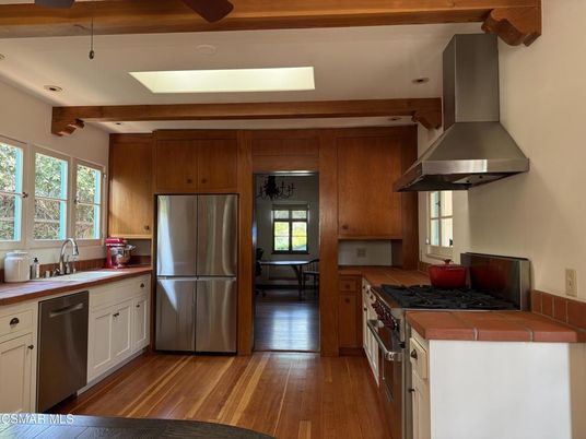 Interior, Kitchen, Recessed Lighting, Stainless Steel Appliances, Tile Countertops, Wood Texture Flooring