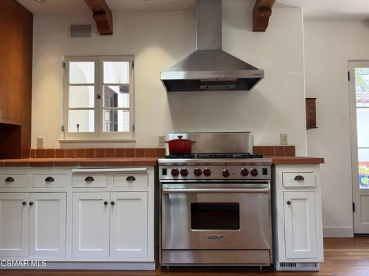 Interior, Kitchen, Stainless Steel Appliances, Tile Countertops, Wood Texture Flooring