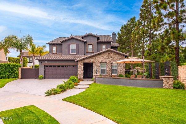 Attached, Backyard, Exterior, Facade, Brick Facade, Mediterranean