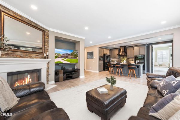 Fireplace, Interior, Kitchen, Living room, Recessed Lighting, Stone Walls, Wood Texture Flooring