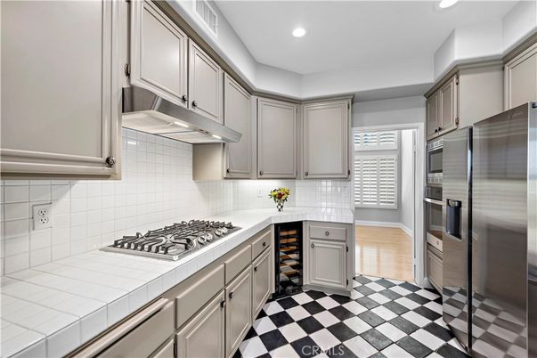 Interior, Kitchen, Recessed Lighting, Stainless Steel Appliances, Tile Countertops