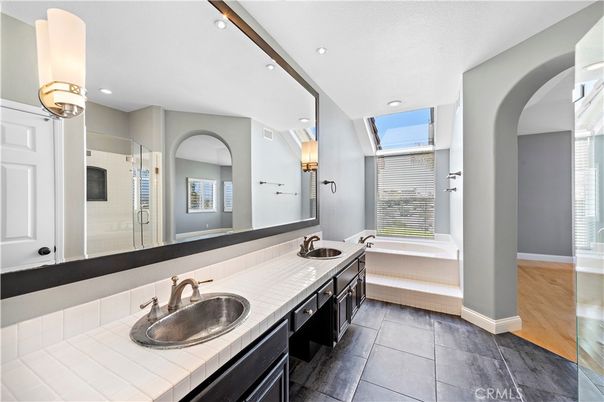Bathroom, Dual Sink Vanities, Interior, Recessed Lighting, Tile Countertops, Wood Texture Flooring