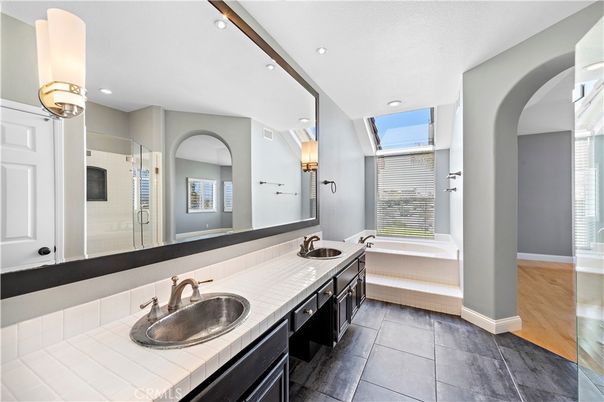 Bathroom, Dual Sink Vanities, Interior, Recessed Lighting, Tile Countertops, Wood Texture Flooring