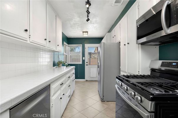 Interior, Kitchen, Stainless Steel Appliances, Tile Countertops