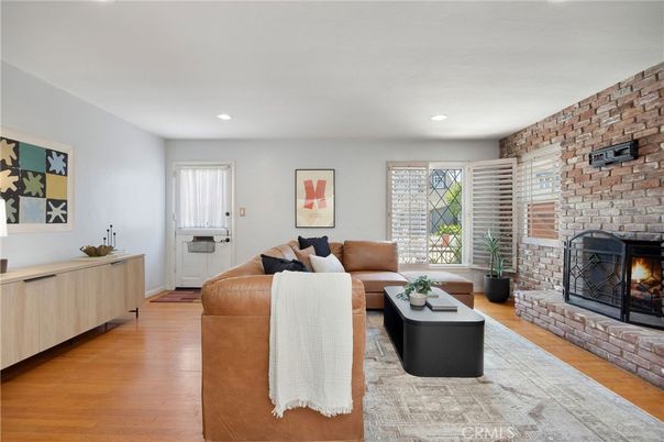 Fireplace, Interior, Living room, Recessed Lighting, Stone Walls, Wood Texture Flooring