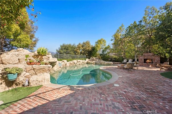 Exterior, Fireplace, Pool