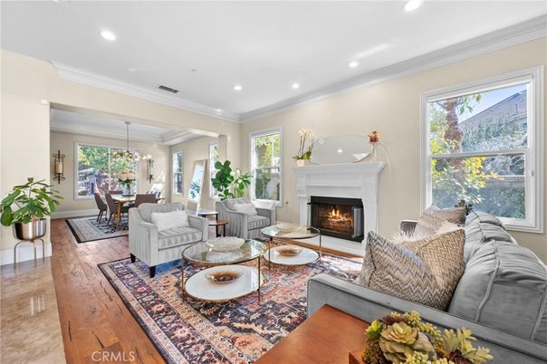 Chandelier, Dining room, Fireplace, Interior, Living room, Recessed Lighting, Wood Texture Flooring