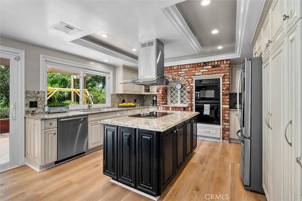Interior, Kitchen, Recessed Lighting, Stainless Steel Appliances, Stone Walls, Wood Texture Flooring