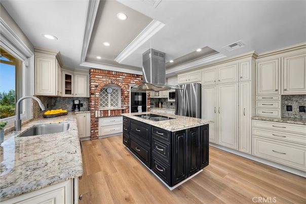 Interior, Kitchen, Recessed Lighting, Stainless Steel Appliances, Stone Walls, Wood Texture Flooring