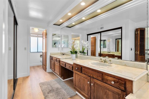 Bathroom, Dual Sink Vanities, Interior, Recessed Lighting, Wood Texture Flooring