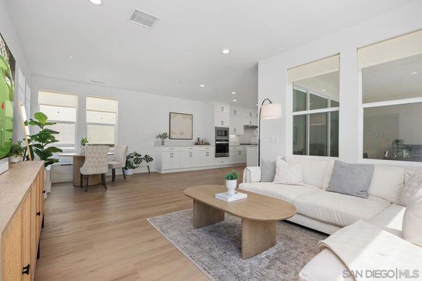 Dining room, Interior, Kitchen, Living room, Recessed Lighting, Stainless Steel Appliances, Wood Texture Flooring