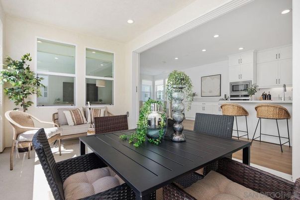 Dining room, Interior, Kitchen, Living room, Recessed Lighting, Stainless Steel Appliances, Wood Texture Flooring