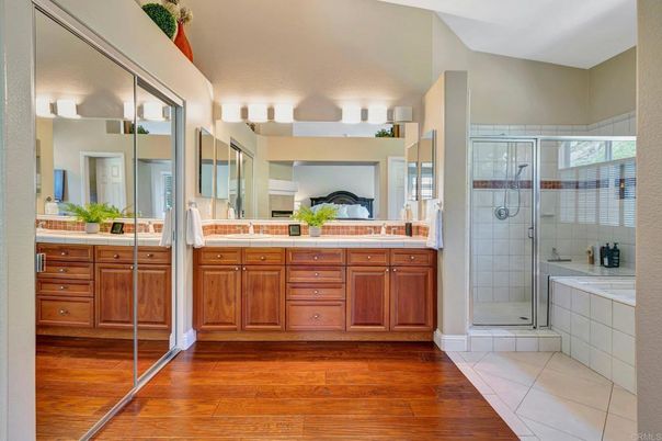 Bathroom, Dual Sink Vanities, Glass Shower, Interior, Wood Texture Flooring