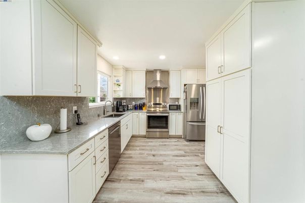 Interior, Kitchen, Recessed Lighting, Stainless Steel Appliances, Wood Texture Flooring
