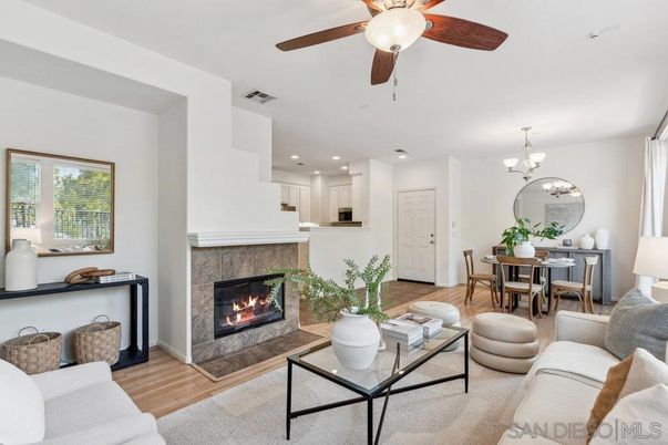 Chandelier, Dining room, Fireplace, Interior, Living room, Recessed Lighting, Wood Texture Flooring