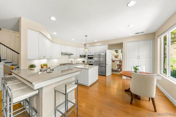 Dining room, Interior, Kitchen, Pendant Lights, Recessed Lighting, Stainless Steel Appliances, Wood Texture Flooring