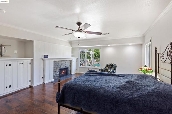Bedroom, Fireplace, Interior, Recessed Lighting, Wood Texture Flooring