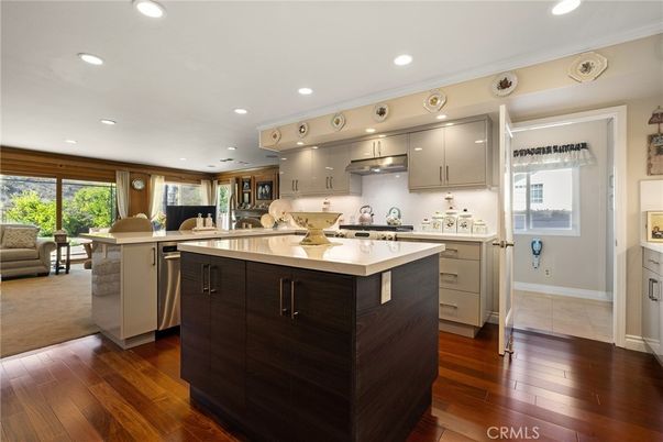 Dining room, Interior, Kitchen, Recessed Lighting, Stainless Steel Appliances, Wood Texture Flooring