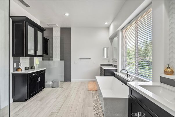 Bathroom, Dual Sink Vanities, Interior, Recessed Lighting, Wood Texture Flooring