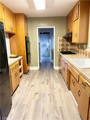 Interior, Kitchen, Tile Countertops, Wood Texture Flooring