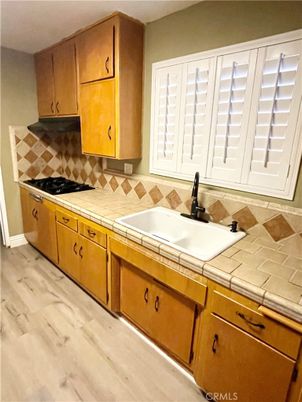 Interior, Kitchen, Tile Countertops, Wood Texture Flooring