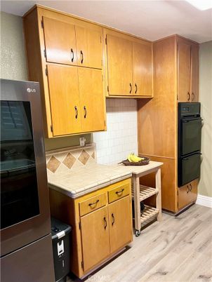 Interior, Kitchen, Tile Countertops, Wood Texture Flooring