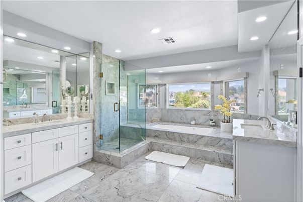 Bathroom, Dual Sink Vanities, Glass Shower, Interior, Marble, Marble Walls, Recessed Lighting