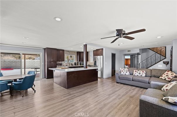 Dining room, Interior, Kitchen, Living room, Recessed Lighting, Stainless Steel Appliances, Wood Texture Flooring