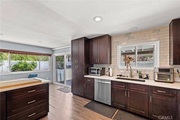 Interior, Kitchen, Recessed Lighting, Stainless Steel Appliances, Stone Walls, Wood Texture Flooring