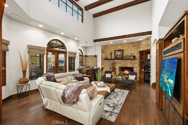 Fireplace, Interior, Living room, Pendant Lights, Recessed Lighting, Stone Walls, Wooden Beams, Wood Texture Flooring