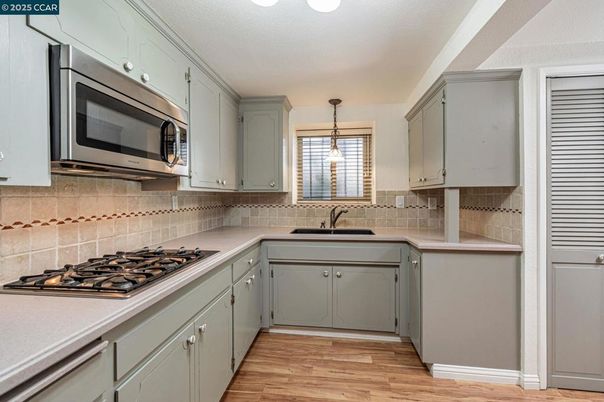 Interior, Kitchen, Pendant Lights, Stainless Steel Appliances, Wood Texture Flooring