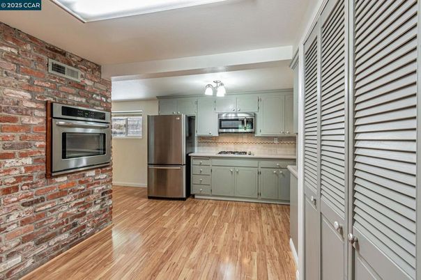 Interior, Kitchen, Stainless Steel Appliances, Stone Walls, Wood Texture Flooring