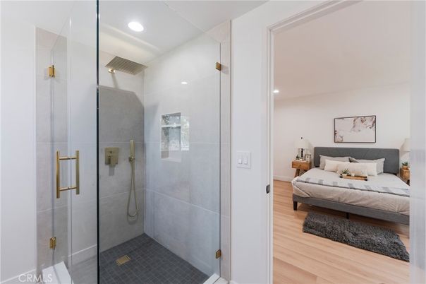 Bathroom, Bedroom, Glass Shower, Interior, Recessed Lighting, Wood Texture Flooring