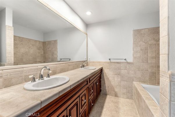 Bathroom, Dual Sink Vanities, Interior, Recessed Lighting, Tile Countertops