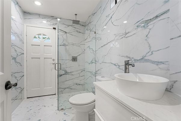 Bathroom, Free Standing Baths, Glass Shower, Interior, Marble, Marble Walls, Recessed Lighting