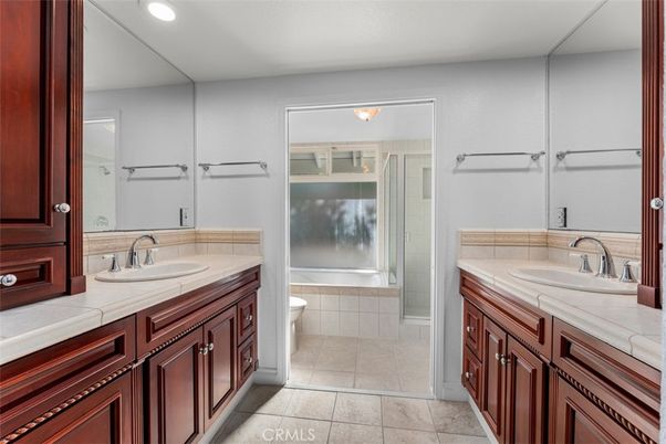 Bathroom, Dual Sink Vanities, Interior, Recessed Lighting, Tile Countertops