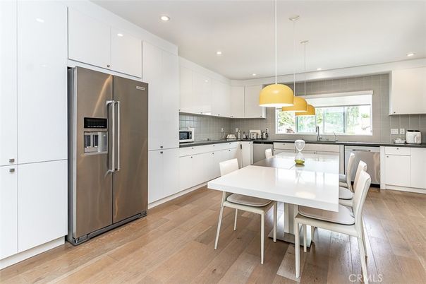 Dining room, Interior, Kitchen, Pendant Lights, Recessed Lighting, Stainless Steel Appliances, Wood Texture Flooring