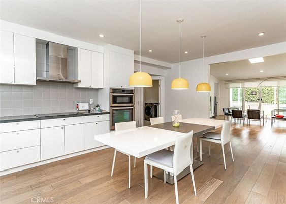Dining room, Interior, Kitchen, Pendant Lights, Recessed Lighting, Stainless Steel Appliances, Wood Texture Flooring