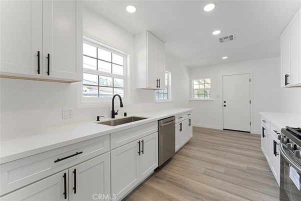 Interior, Kitchen, Recessed Lighting, Stainless Steel Appliances, Wood Texture Flooring