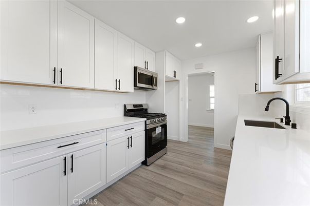Interior, Kitchen, Recessed Lighting, Stainless Steel Appliances, Wood Texture Flooring