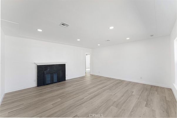Empty room, Fireplace, Interior, Recessed Lighting, Wood Texture Flooring