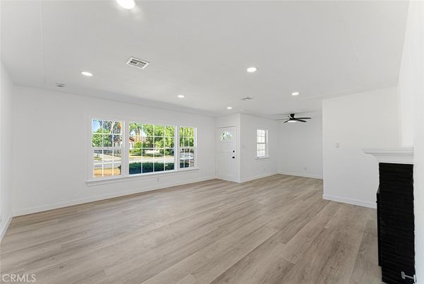 Empty room, Fireplace, Interior, Recessed Lighting, Wood Texture Flooring