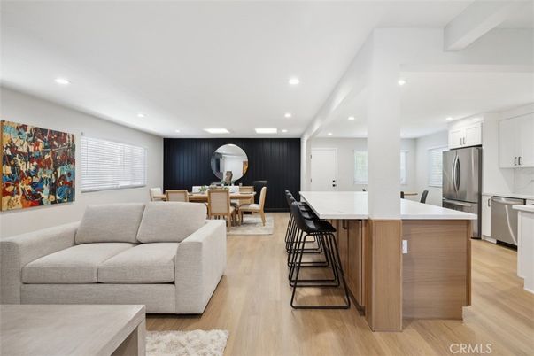 Dining room, Interior, Kitchen, Living room, Recessed Lighting, Stainless Steel Appliances, Wood Texture Flooring