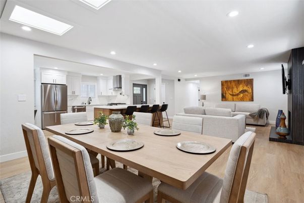 Dining room, Interior, Kitchen, Living room, Recessed Lighting, Stainless Steel Appliances, Wood Texture Flooring
