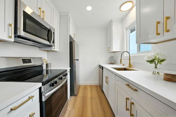 Interior, Kitchen, Recessed Lighting, Stainless Steel Appliances, Wood Texture Flooring