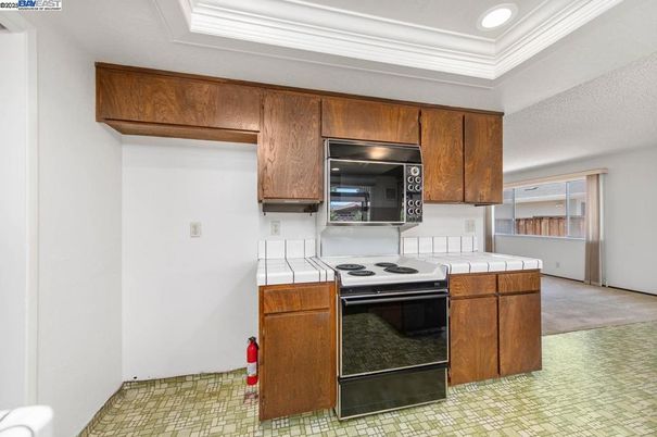 Interior, Kitchen, Recessed Lighting, Tile Countertops